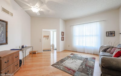 Large bonus room with natural light and open layout, perfect for a home office, hobby room, or additional living space.