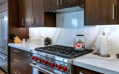 Large island with seating and quartz countertops, creating the perfect gathering space in this open-concept Phoenix home.
