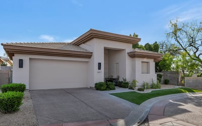 Modern Phoenix exterior featuring a clean facade, private entry, and attached garage in a desirable community setting.