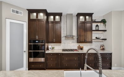 Custom kitchen with built-in oven, sleek cabinetry, and gas cooktop, offering both functionality and luxury in this Scottsdale property.