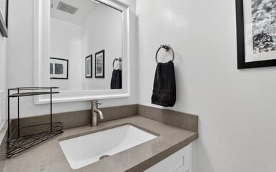 Contemporary Scottsdale bathroom vanity featuring sleek countertops, updated fixtures, and clean cabinetry for a polished, modern feel.