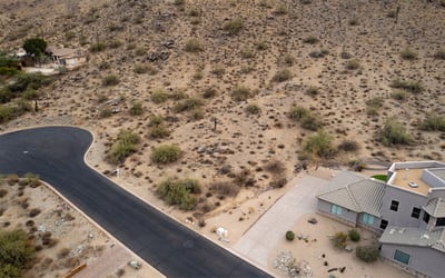 Quiet cul-de-sac homesite positioned against scenic desert mountains in Phoenix. This elevated lot offers privacy, natural beauty, and excellent potential for a luxury custom home retreat.