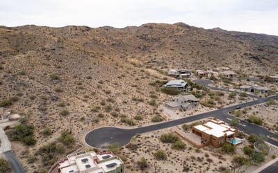 Sweeping aerial views capture the beauty of the Phoenix valley from this elevated desert homesite. Surrounded by mountain scenery and luxury properties, this lot offers exceptional custom build possibilities.