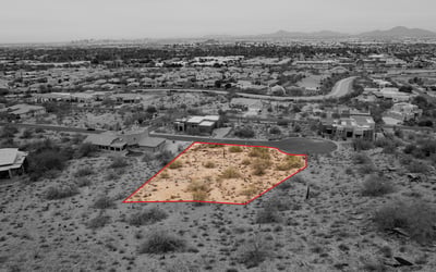 Scenic hillside homesite offering privacy, elevated views, and natural desert surroundings in Phoenix. Nearby luxury homes and mountain scenery create a truly exceptional build opportunity.