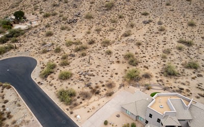 Stunning hillside lot located within the natural desert landscape of Phoenix. Surrounded by mountain scenery and luxury custom homes, this elevated property offers privacy and exceptional build possibilities.