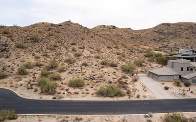 Elevated desert homesite with nearby hiking trail access and scenic mountain views. This Phoenix property combines natural desert beauty, privacy, and luxury custom home potential in a highly desirable hillside location.