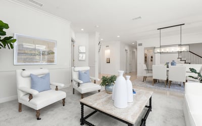 Family room featuring comfortable seating and a contemporary dining area, perfect for gatherings.