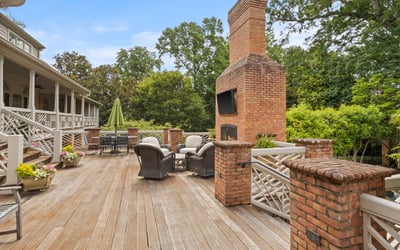 Brazilian IPE Ironwood Deck, with fireplace overlooking backyard and pool
