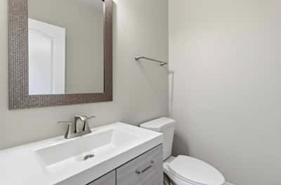 Updated modern half bath on main level