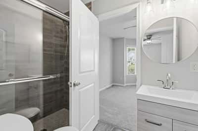 Modern Jack & Jill full bathroom addition with tile shower