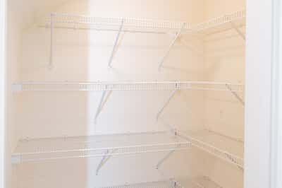 Pantry with wire shelving, perfect for organizing your essentials and maximizing functionality.