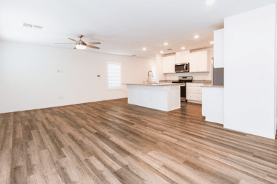 Spacious open-concept living area featuring modern finishes and abundant natural light throughout.