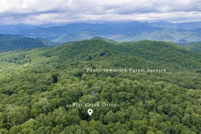Secluded land with stunning mountain views, perfect for your dream home in nature's embrace.