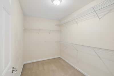 Walk-in closet in primary suite