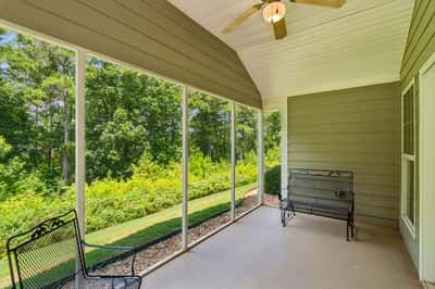Screened rear porch off the living room - very private!