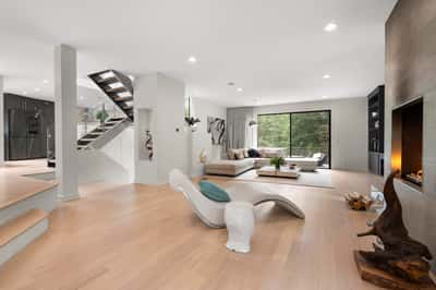Spacious living area with unique architectural features and abundant natural light, perfect for modern living.
