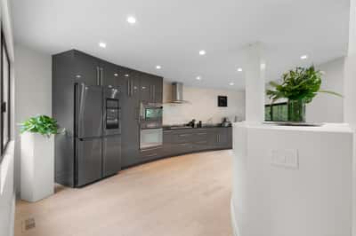 Modern kitchen featuring sleek cabinetry, stainless steel appliances, and an inviting open layout for effortless entertaining.
