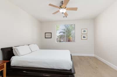 Downstairs bedroom and bath (can be second primary bedroom)