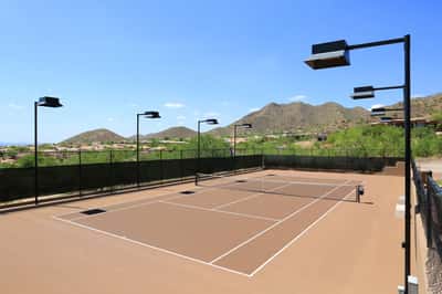 Well-maintained, lighted tennis court with scenic views supports an active Scottsdale lifestyle within the community.