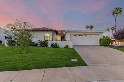 This inviting Scottsdale residence welcomes you with mature landscaping, attractive architectural details, and a spacious two-car garage, offering exceptional curb appeal in the sought-after Briarwood community.