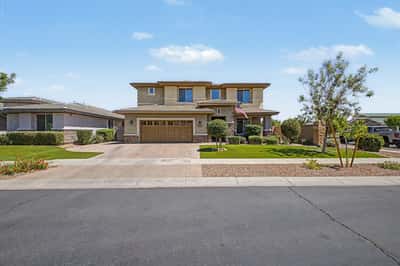 Attractive two-story residence featuring professional landscaping, stone accents, paver driveway, and a spacious 3-car garage. A beautifully maintained home offering exceptional curb appeal in Mesa.