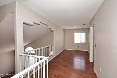 Expansive upstairs loft is ideal for a home office, game room, study area, or second family room, offering exceptional flexibility for modern living.