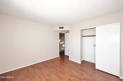 Alternate view highlights the roomy fourth bedroom with ample closet space and flexible functionality for today's lifestyle.
