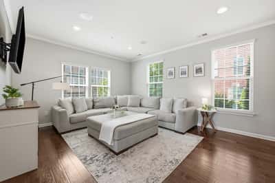 The living room receives ample natural light.