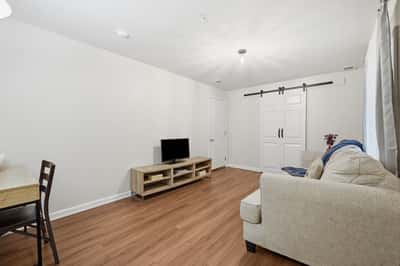 Bright and inviting living space featuring modern finishes and ample natural light, perfect for relaxation and entertainment.