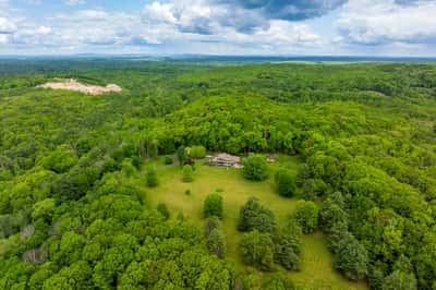 Spacious acreage surrounded by lush greenery, ideal for a private retreat or development opportunity.