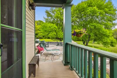 Discover a tranquil outdoor space with vibrant landscaping, perfect for relaxation and entertaining.
