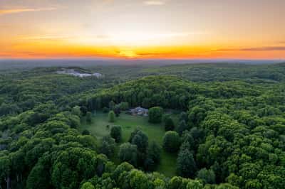 Stunning panoramic views from this spacious property, surrounded by lush greenery and tranquil landscapes.