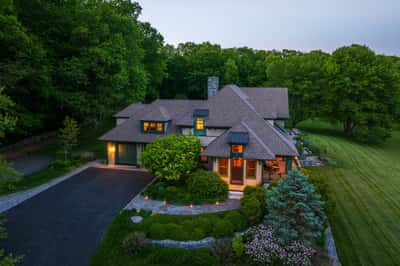 Discover this uniquely designed home, nestled in lush greenery, featuring spacious outdoor areas and modern amenities.
