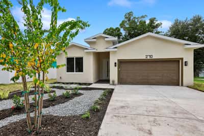 This modern home features a spacious layout, low-maintenance landscaping, and a convenient two-car garage.
