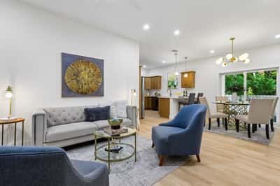 Contemporary living space featuring an open layout, modern furnishings, and abundant natural light throughout.