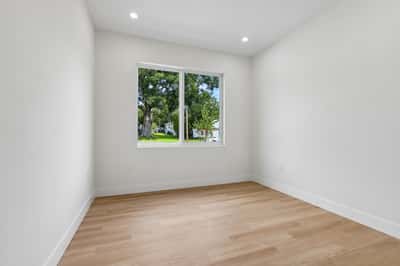 Bright, versatile room with abundant natural light and a large window