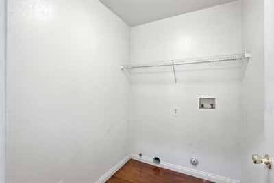 Versatile space offering potential for storage or a home office in a well-lit environment.