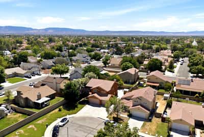 Explore this well-designed neighborhood, featuring spacious lots, tree-lined streets, and stunning mountain views.
