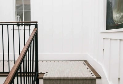 Discover a stunning staircase featuring elegant decor and inviting natural light, perfect for your dream home.