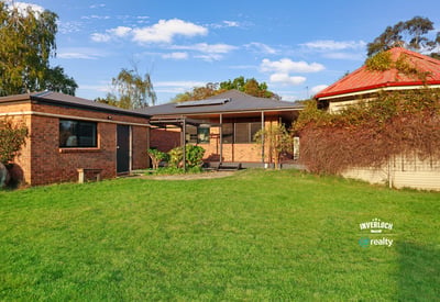 Spacious outdoor area complements this inviting property, perfect for relaxation and entertaining in a family-friendly neighborhood.