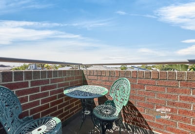 Enjoy stunning panoramic views from this private rooftop terrace, perfect for relaxation or entertaining.