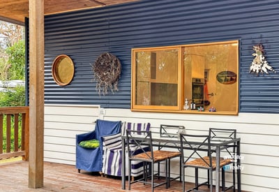 Enjoy outdoor living on this inviting patio, perfect for relaxed gatherings and morning coffee.