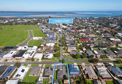 Expansive coastal lot in a developing neighborhood, offering stunning water views and convenient access to local amenities.