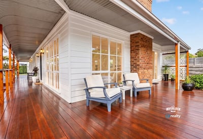 Spacious deck perfect for outdoor relaxation, featuring ample natural light and modern architectural details.