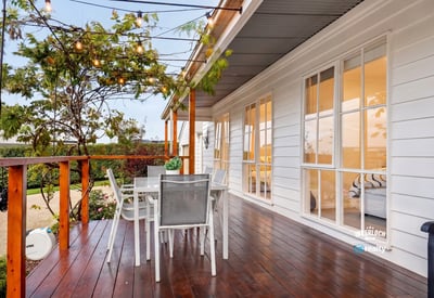 Inviting outdoor space with string lights, perfect for entertaining or relaxing in the fresh air.