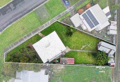 Spacious property featuring a generous yard and versatile layout, perfect for outdoor activities and potential expansions.