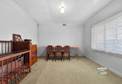 Spacious room with abundant natural light, ideal for an office or creative workspace.