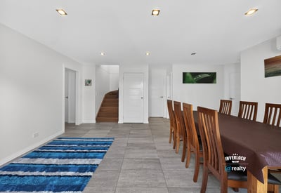 Spacious dining area features modern finishes, natural light, and a seamless flow to adjacent living spaces.
