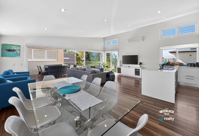 Bright and airy open-concept living space with modern furnishings and spectacular views. Perfect for entertaining.