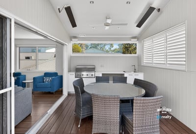 Bright and spacious outdoor entertaining area featuring modern amenities and a seamless indoor-outdoor flow.